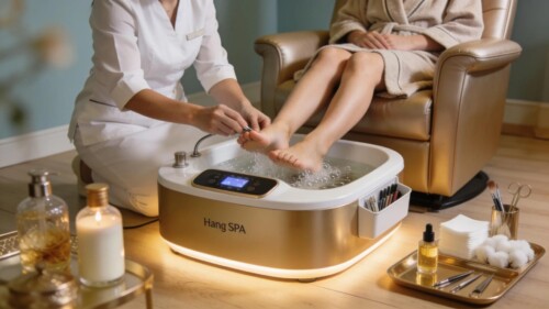 Salon professional using a Hang Spa pedicure treatment system for client relaxation